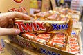 Tyumen, Russia-January 26, 2023: Twix is a caramel shortbread chocolate bar made by Mars, Inc. With clipping path