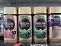 Tyumen, Russia-July 28, 2022: Nescafe Gold origins alta rica, sumatra. Powdered coffee made by Nestle