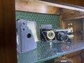 Tyumen, Russia-July 28, 2022: Old retro cameras in the museum, an exhibition of old photo accessories. The history of