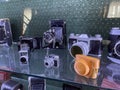 Tyumen, Russia-July 28, 2022: Old retro cameras in the museum, an exhibition of old photo accessories. The history of