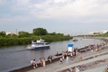 Tyumen, Russia, on July 29, 2018: Walking motor ships float along brisk Tura River Embankment in Tyumen.