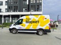Tyumen, Russia-June 14, 2023: Branded cargo van of a large Russian marketplace Yandex Market. Text in russian: Yandex