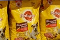 Tyumen, Russia-June 30, 2022: Dog food products of Pedigree Petfoods, selective focus. Buying goods in the supermarket