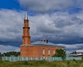 Local mosque from red bricks in the Siberian village Novoaptula, Russia