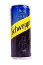 Tyumen, Russia-May 25, 2021: Can of the Schweppes logo close up. Water drops. Vertical photo. Isolated on white