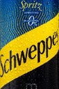 Tyumen, Russia-May 25, 2021: Can of the Schweppes logo close up. Water drops. Vertical photo