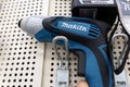 Tyumen, Russia-May 05, 2023: Makita cordless driver drill removal. Technician tools. Selective focus