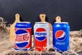 Tyumen, Russia-November 01, 2020: cans of Pepsi logo with design from the 40s, 50s, 80s and 90s retro, rustic style