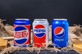 Tyumen, Russia-November 01, 2020: cans of Pepsi logo with design from the 40s, 50s, 80s and 90s retro, rustic style