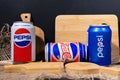 Tyumen, Russia-November 01, 2020: Cans of Pepsi in a retro rustic style. owned by the American company PepsiCo