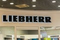 Tyumen, Russia-October 01, 2022: Liebherr logo, at Liebherr exhibition pavilion showroom. Sale of refrigerators