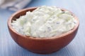 Tzatziki in a wooden bowl