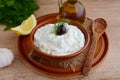 Tzatziki - yoghurt sauce with cucumber, dill, olive oil, lemon and garlic in a traditional bowl,traditional greek