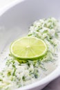 tzaziki salad with lime in white bowl Royalty Free Stock Photo
