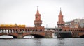 U-Bahn train passing over Oberbaum Bridge in Berlin, Germany Royalty Free Stock Photo