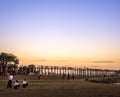 U Bein Bridge, the oldest and longest teakwood bridge in the world. Sunset sky with colorful gradation. Royalty Free Stock Photo