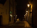 U Luzickeho Seminare street at night, dark and empty, in the city center of Prague, with a cobblestone pavement Royalty Free Stock Photo