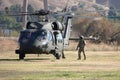 U.S. Army Blackhawk Helicopter and Crew Chief After Landing