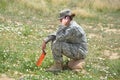 U.S. Army Female soldier taking a break to make a call.