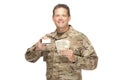 U.S. Army Soldier, Sergeant. Isolated with gift card and cash. Royalty Free Stock Photo