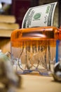 U.S. Dollar banknote in a paper shredder Royalty Free Stock Photo