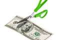 U.S. dollars bills and scissors Royalty Free Stock Photo