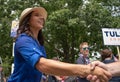 U.S. Rep. Tulsi Gabbard shakes hands during the July 4 parade in Amherst, New Hampshire, USA, on July 4, 2019