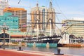 U.S.S. Constellation historic ship docked in Baltimore Inner Harbor in winter.