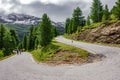 U-shape curved road in gavia pass with blurred cyclists