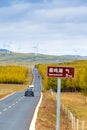 An U-shape highway in golden forest in Bashang grassland