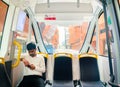 UAE, Abu Dhabi - 13th march, 2023: interior of Navya masdar city autonomous vehicle while driving window passengers point of view Royalty Free Stock Photo