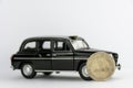 UAE 1 dirham coin on black car. Royalty Free Stock Photo