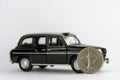 UAE 1 dirham coin on black car. Royalty Free Stock Photo