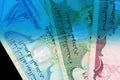 UAE dirham currency notes. Money background blue color toned