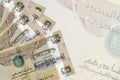 200 UAE dirhams bills lies in stack on background of big semi-transparent banknote. Abstract business background Royalty Free Stock Photo