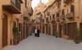 UAE, Dubai, Al Fahidi Old Neighbourhood, with narrow streets and traditional brown sandstone buildings Royalty Free Stock Photo