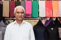 UAE / DUBAI - 20 DEZ 2018 - Portrait of Indian Seller in a souk market shop in Dubai. UAE