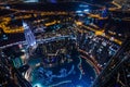 UAE, Dubai, 06/14/2015, downtown dubai futuristic city neon lights and sheik zayed road shot from the worlds tallest tower Royalty Free Stock Photo