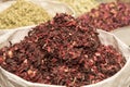 UAE, Dubai, Dry red hibiscus tea leaves and other spices for sale in the spice souq in Deira. Royalty Free Stock Photo