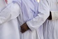 UAE Dubai group of traditionally dressed Muslim men perform a song for visitors to the Bastakia Royalty Free Stock Photo