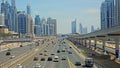 UAE, Dubai - United Arab Emirates 01 April 2024 Time lapse Busy Highway Street Scene in Urban Dubai, Traffic flows on a