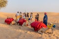 UAE - OCTOBER 16, 2021: Camel tourist ride in a desert of United Arab Emirat Royalty Free Stock Photo