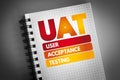 UAT - User Acceptance Testing acronym on notepad, technology concept background Royalty Free Stock Photo