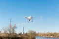 Uav drone copter flying with digital camera. Hexacopter drone with high resolution digital camera on the sky. The drone flies over Royalty Free Stock Photo