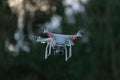 5 - UAV remote control white drone hovers with plain background