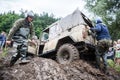 Uaz 469 overcomes a muddy pit. Royalty Free Stock Photo