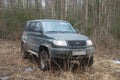 UAZ-Patriot stuck in the mud, in woods, april
