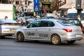 Uber car in traffic, modern city taxi service. Car pollution, traffic jam in the morning and evening in the capital city of Royalty Free Stock Photo