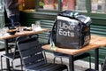 Uber eats bike bag logo band and text sign delivery man with backpack Ubereats deliver