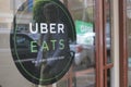 Uber Eats Sign on a restaurant door Royalty Free Stock Photo